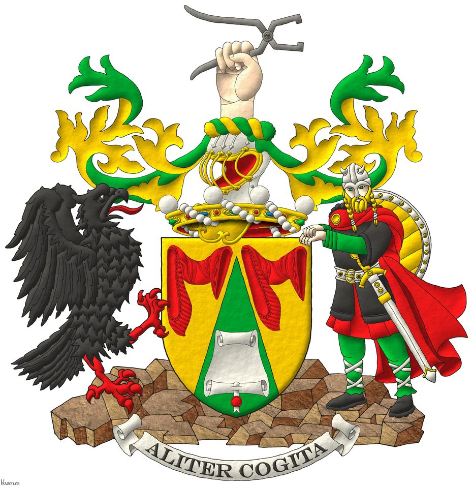 Escudo de oro, en una pira de sinople acompa�ada de dos mangas de gules, un pergamino abierto de plata, con un sello de lacre pendiente al natural. Timbrado de un yelmo acorde con su rango saliente de una corona de bar�n sumada al escudo y adornado de dos lambrequines de sinople doblados de oro, un burelete de oro y sinople, cimado de una mano diestra puesta en palo de carnaci�n, teniendo unos alicates abiertos al natural. Soportes: Diestro un �guila alzando el vuelo de sable, lampasada, membrada y armada de gules y siniestro un guerrero vikingo al natural, terrazados de rocas. Lema: �Aliter Cogita�.