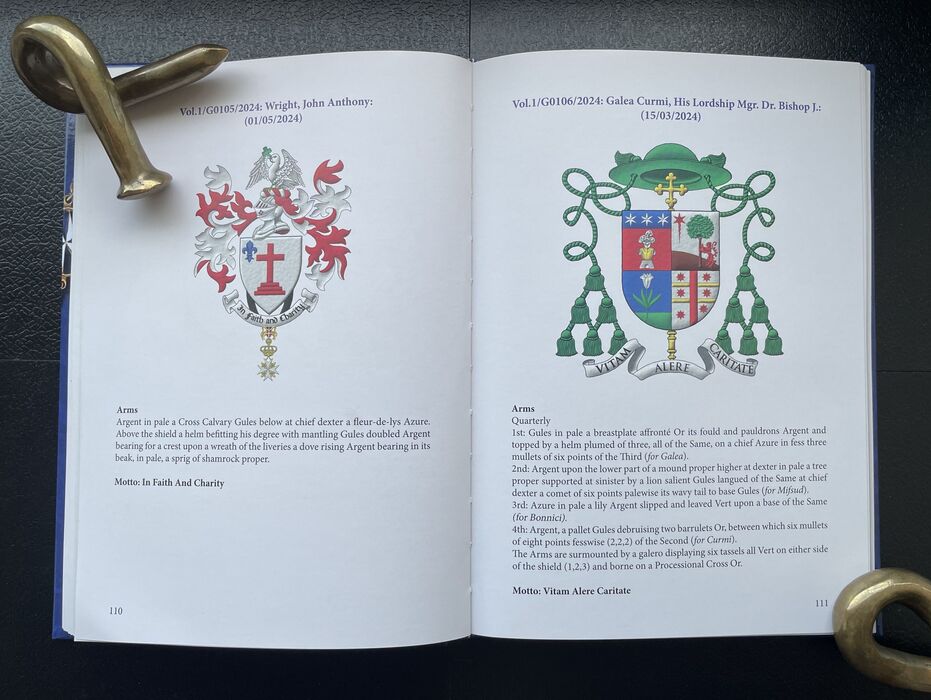 Double page spread 110-111 from the book with two coats of arms painted by me.