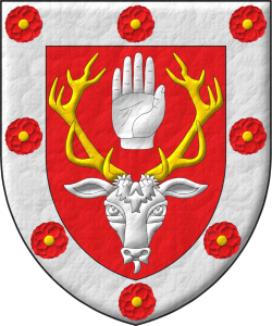 Escudo de gules, un rencuentro de ciervo de plata, ramado de oro, entre sus cuernas, una mano diestra apalmada y cortada por la mueca; una bordura de plata cargada de ocho camelia de Gules, botonadas de oro.